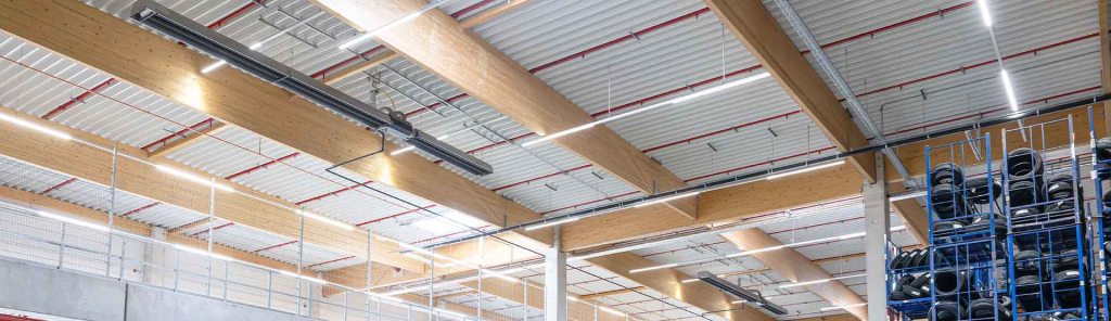 Schwank infrared radiant heaters under the roof of a logistics hall